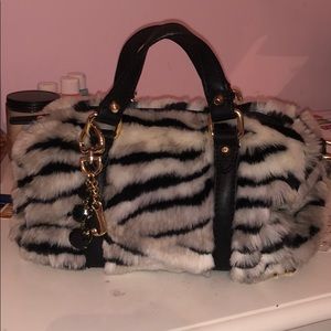 juicy couture hand bag zebra printed never used.